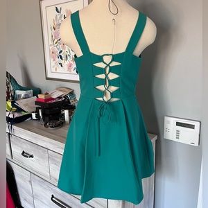 Teal lace-up mini dress